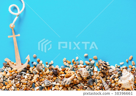 Blue background with anchor and rope on the pebble Blue background with anchor and rope on the pebble 38396661