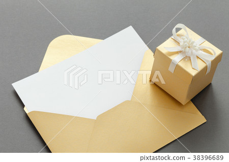Open yellow paper envelope with blank paper sheet 38396689