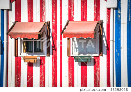 Colorful striped fishermen's houses blue and red Colorful striped fishermen's houses blue and red 38398038