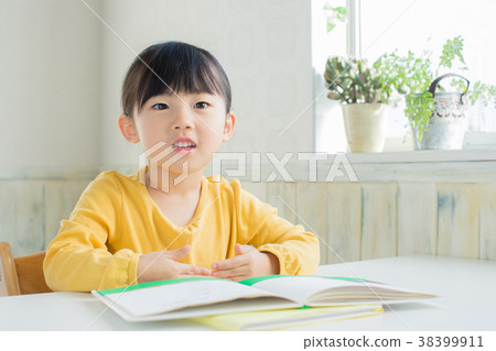 Children reading a picture book Children reading a picture book 38399911