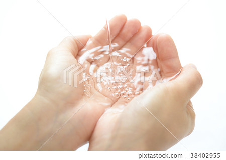 Women's hand scooping water 38402955