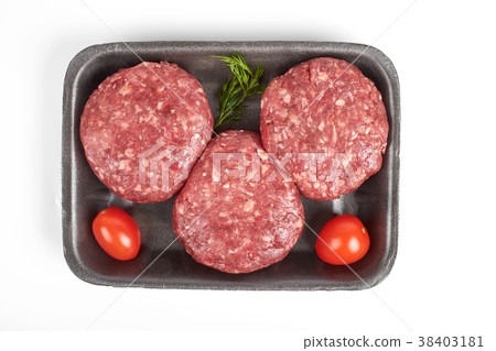 Tray with raw beef burgers or minced meat isolated 38403181