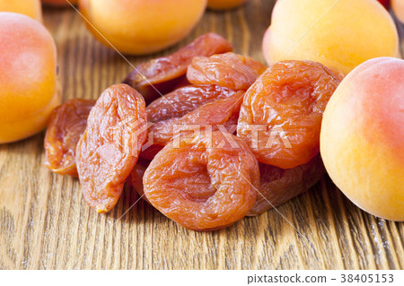 Pile of dried apricots 38405153