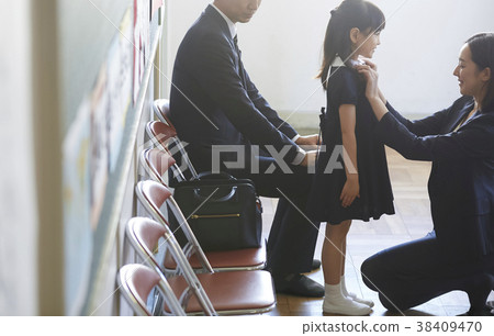 Parents and children waiting for the exam interview 38409470