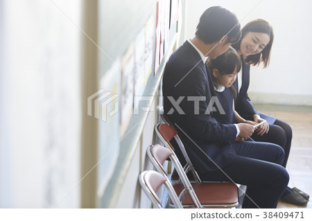 Parents and children waiting for the exam interview 38409471