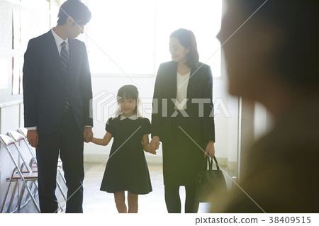 Parents and children waiting for the exam interview Parents and children waiting for the exam interview 38409515