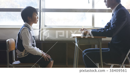 Children who take an interview for the exam 38409561