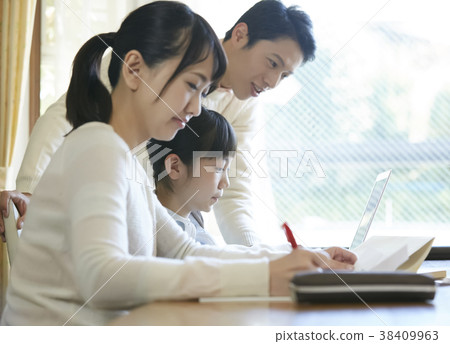 Girl and parents studying Girl and parents studying 38409963