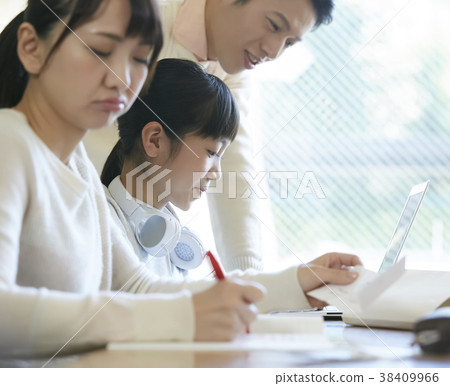 Girl and parents studying Girl and parents studying 38409966