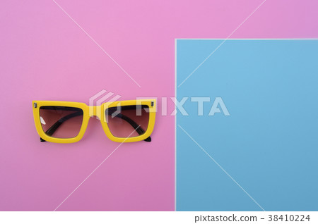 Modern fashionable sunglasses for background Modern fashionable sunglasses for background 38410224