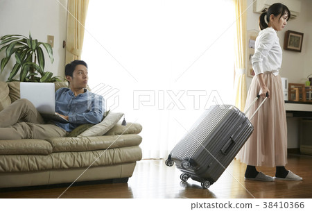 Wife going out home 38410366