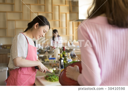 Women cooking Women cooking 38410598