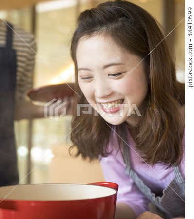 Women cooking Women cooking 38410599