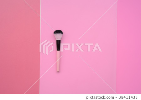 Top view of makeup brushes for background 38411433