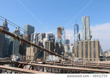 Manhattan skyscrapers viewed from Brooklyn Bridge Manhattan skyscrapers viewed from Brooklyn Bridge 38412754