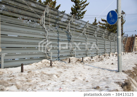 A sidewalk buried in snow. 38413125