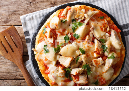 Spicy pizza with chicken, tomatoes, buffalo sauce Spicy pizza with chicken, tomatoes, buffalo sauce 38413532