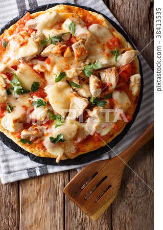Spicy pizza with chicken, tomatoes, buffalo sauce Spicy pizza with chicken, tomatoes, buffalo sauce 38413535