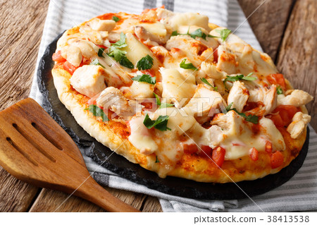 Italian pizza with chicken breast, tomato Italian pizza with chicken breast, tomato 38413538