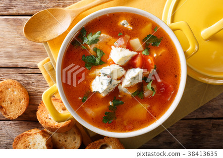 Delicious chicken buffalo soup with tomatoes 38413635