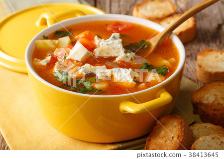 Chicken buffalo soup with vegetables and cheese 38413645