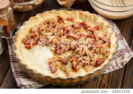 Making stuffing while preparing a quiche Making stuffing while preparing a quiche 38415350
