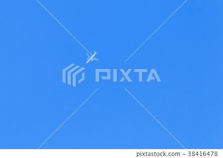 White jet plane flies in sky 38416478