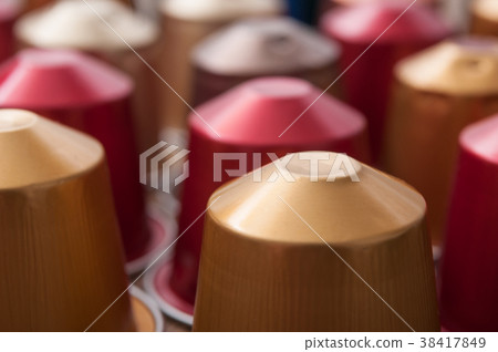 closeup of colorful espresso coffee doses 38417849