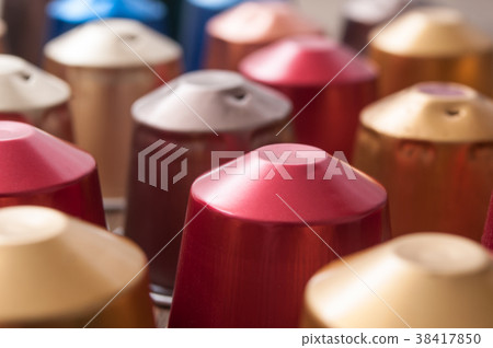 closeup of colorful espresso coffee doses 38417850
