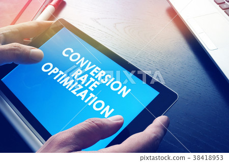 Man is holding Conversion rate optimization report 38418953