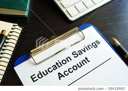 Education savings account ESA form in a clipboard. 38418983