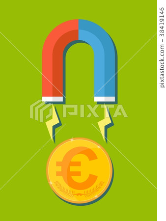 Magnet draws to itself gold coins on a green 38419146