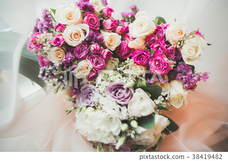 Beautiful wedding bouquet with different flowers Beautiful wedding bouquet with different flowers 38419482