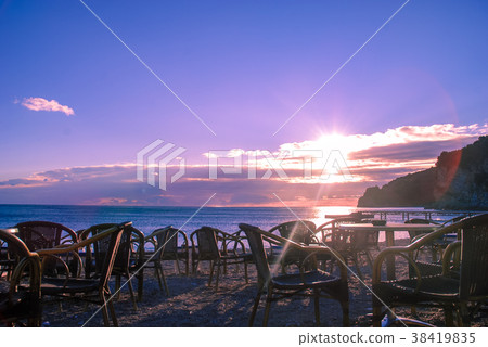 Empty cafe on the beach at sunset by the sea 38419835