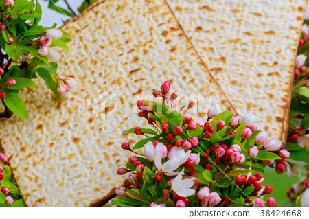 Matzah background matzoh over wooden table. 38424668