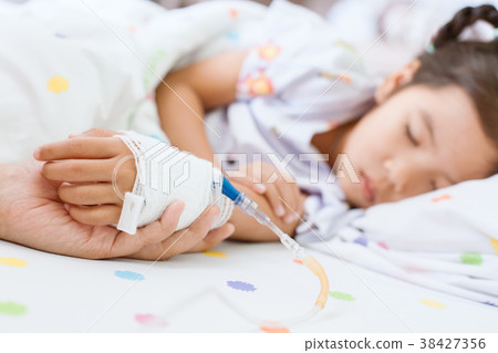 Mother hand holding sick daughter hand 38427356