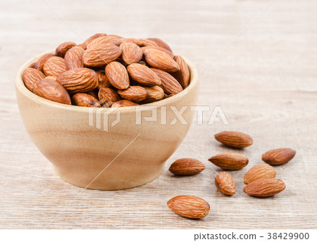 close up some almonds in bowl close up some almonds in bowl 38429900