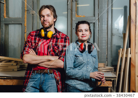 Portrait of carpenters in the workshop. A man and 38430467