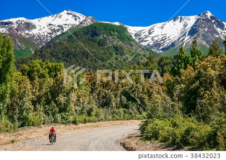Woman cycling in argentinian Lake District 38432023