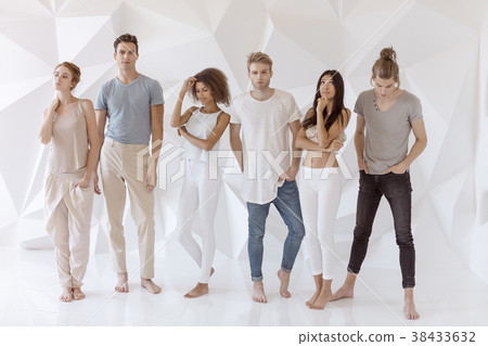 Group of young Multi-ethnic friends indoors in 38433632