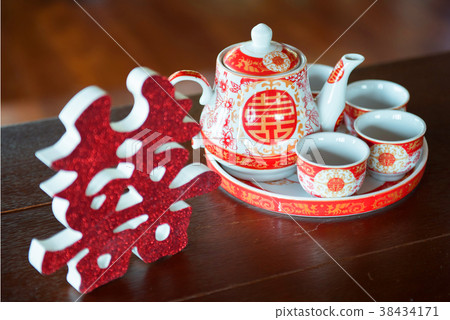 Teapot in traditional Chinese wedding ceremony Teapot in traditional Chinese wedding ceremony 38434171