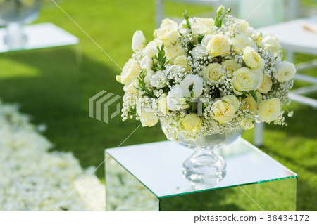 White rose flower bouquet in wedding ceremony 38434172