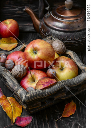 Autumn apples and nuts 38434931