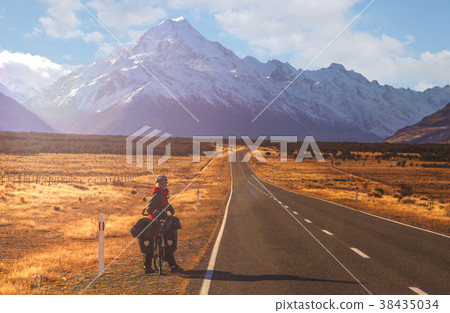 Cycling towards Mount Cook 38435034