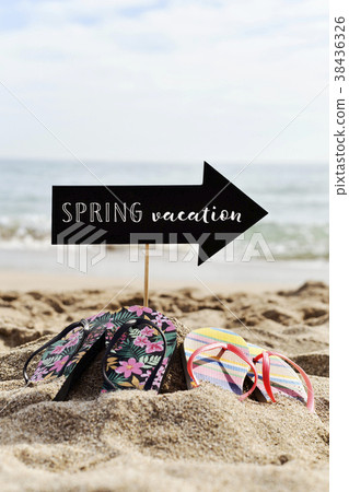 flip-flops on the beach and text spring vacation flip-flops on the beach and text spring vacation 38436326
