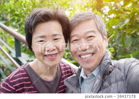 old couple selfie happily 38437178