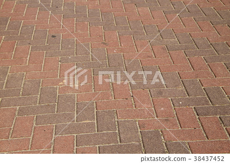 Sidewalk textured background. Detail of a pavement 38437452
