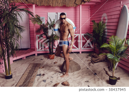 Sexy african american man in shorts standing on Sexy african american man in shorts standing on 38437945