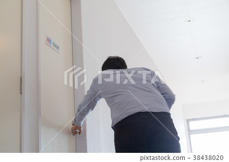 Men who are rushing to the bathroom Men who are rushing to the bathroom 38438020
