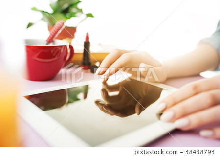 Woman and fruit diet while working on computer in Woman and fruit diet while working on computer in 38438793